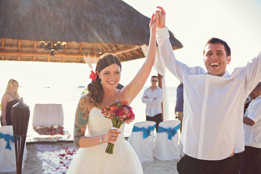 bride and groom celebrate after destination wedding