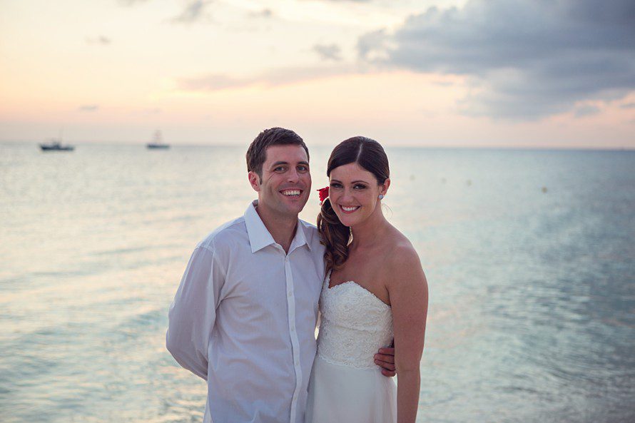 Bride and groom sunset at Occidental Grand Cozumel