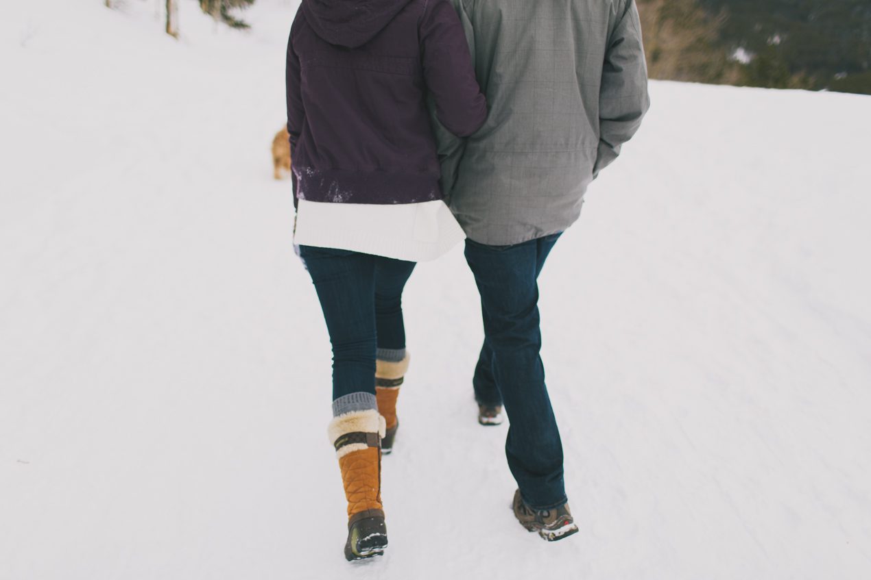 walking in snow engagement photos