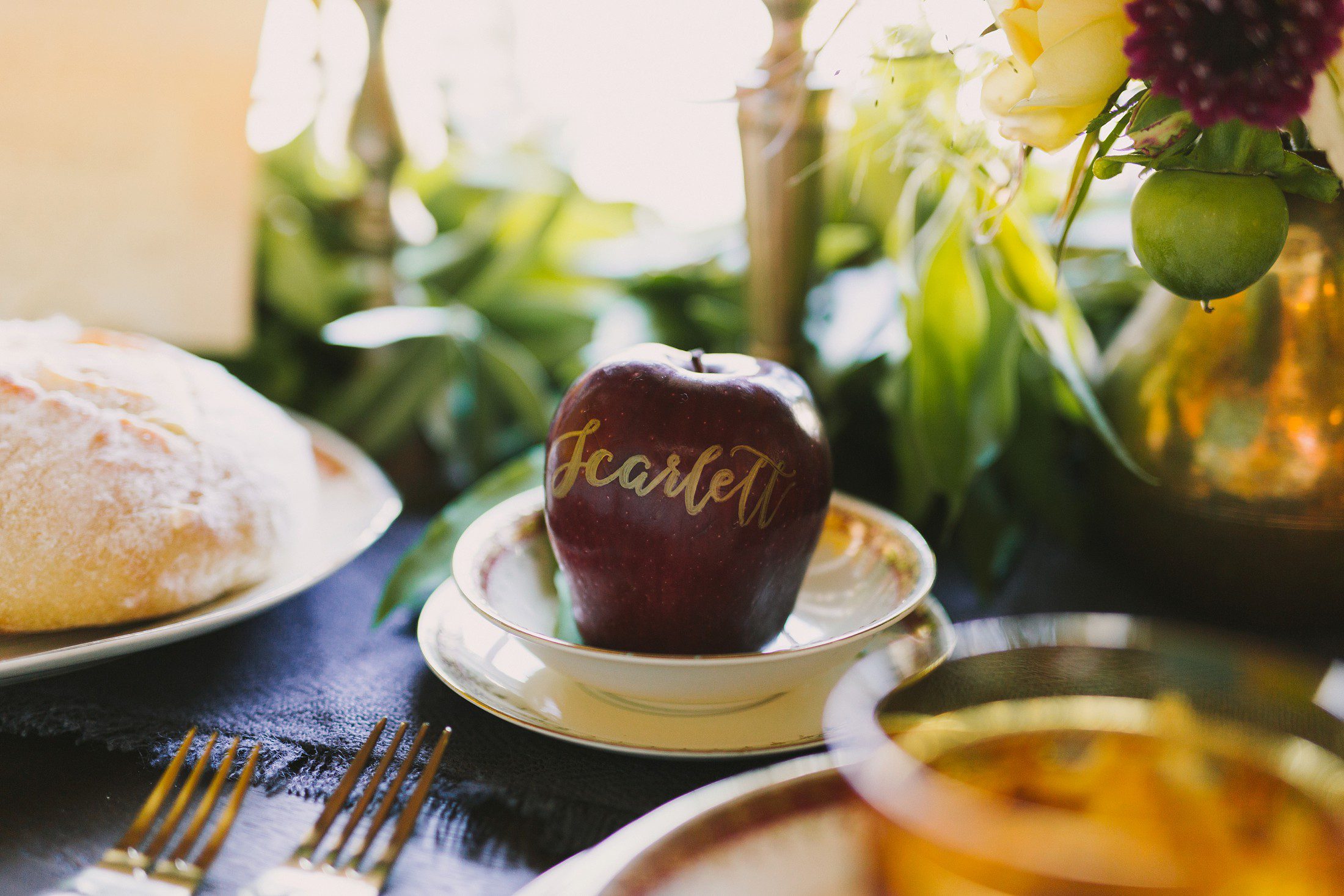 calligraphy on apple for place setting