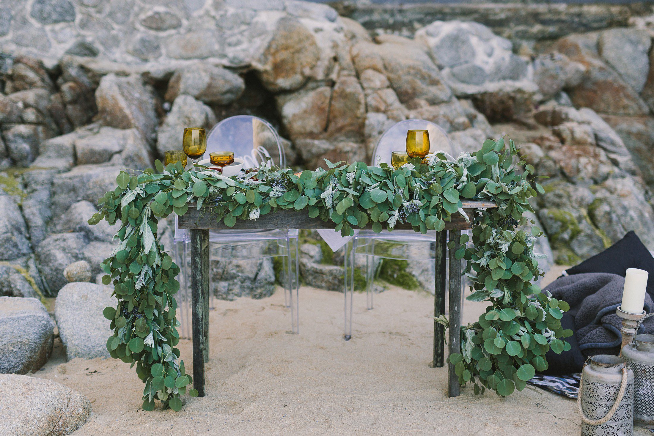 Table draped with garland by Everett Family Farms