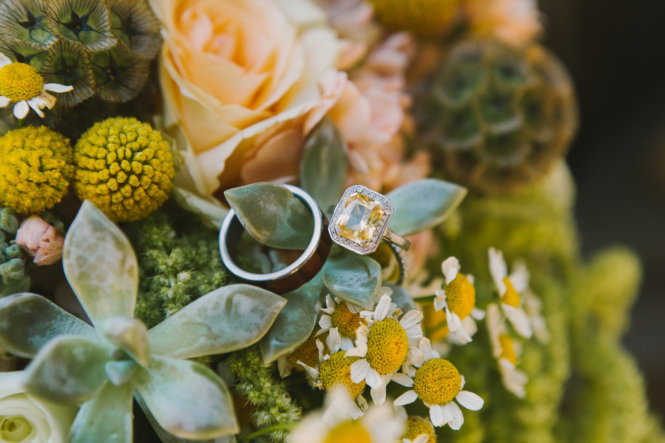 vintage wedding ring in succulent bouquet