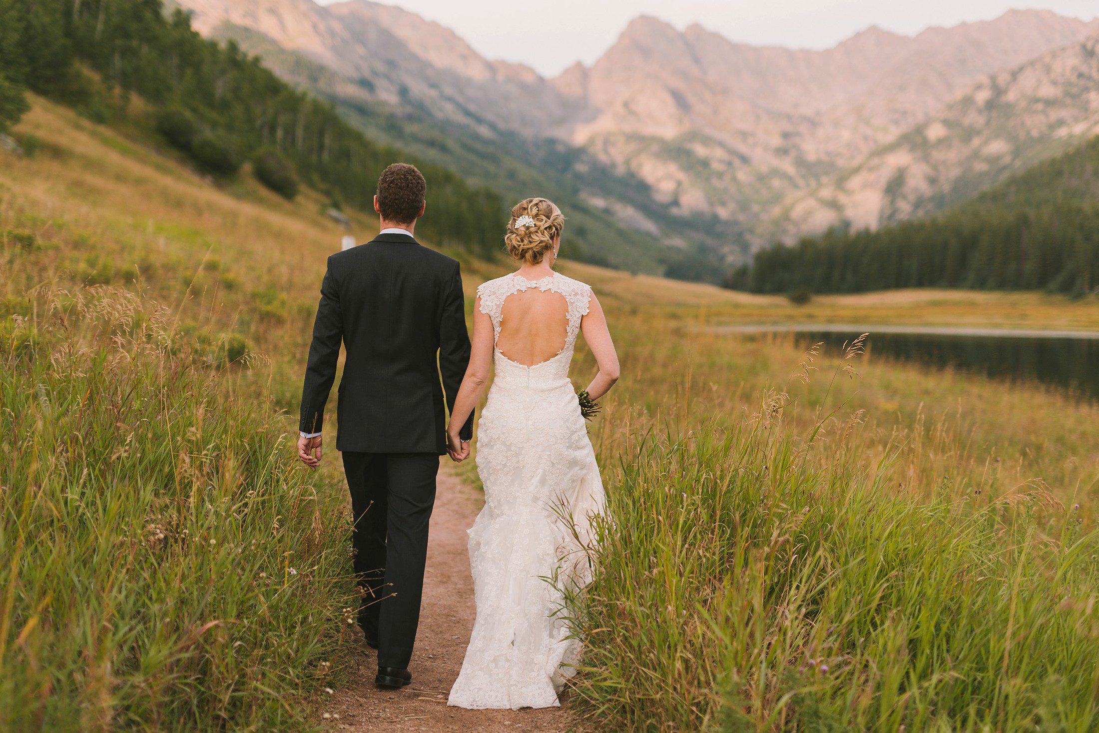 Bride and groom walking at Piney River Ranch