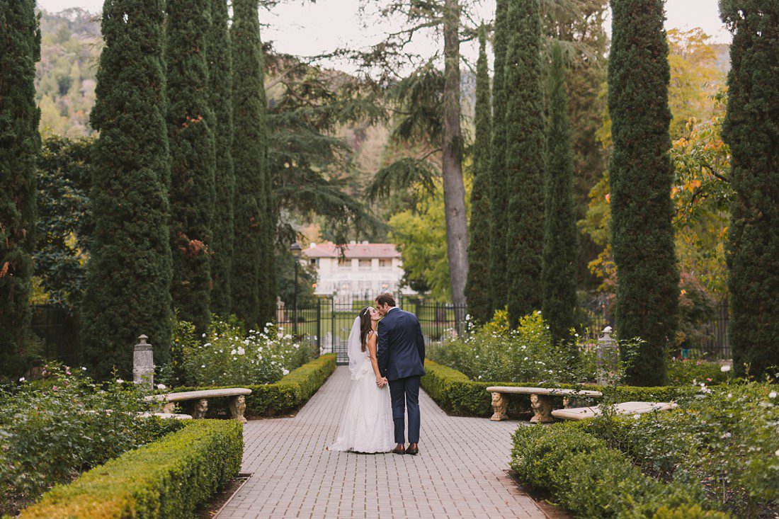 Bride and groom in garden at Villa Montalvo