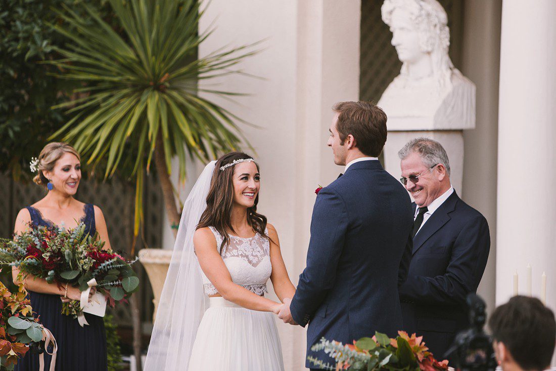 Bride smiling during wedding ceremony at Bride and Groom at Villa Montalvo