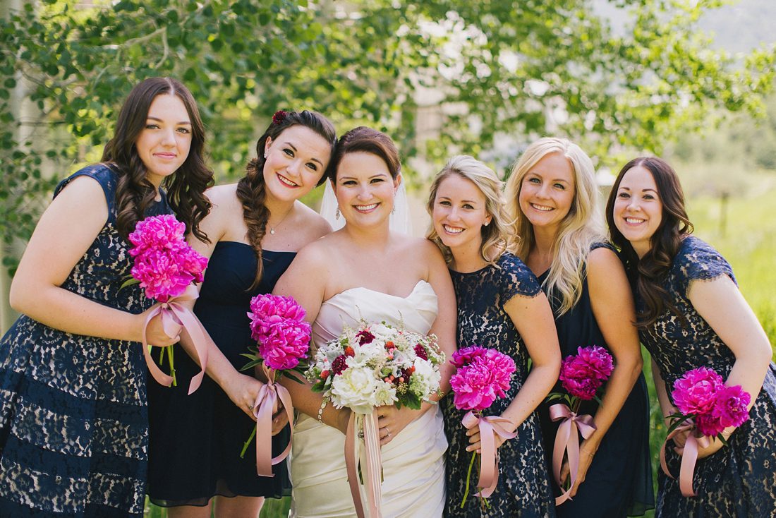 Hot pink peonies in bridesmaid bouquets
