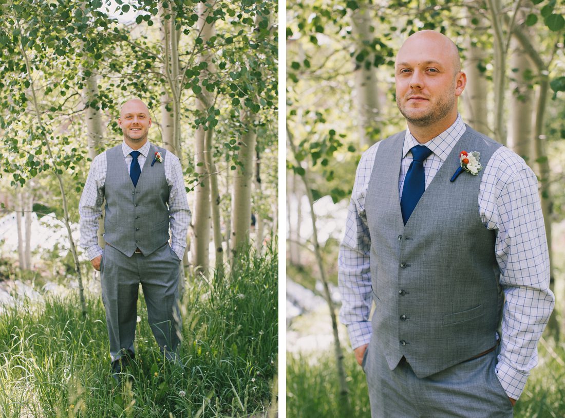 Handsome groom in gray suit on wedding day