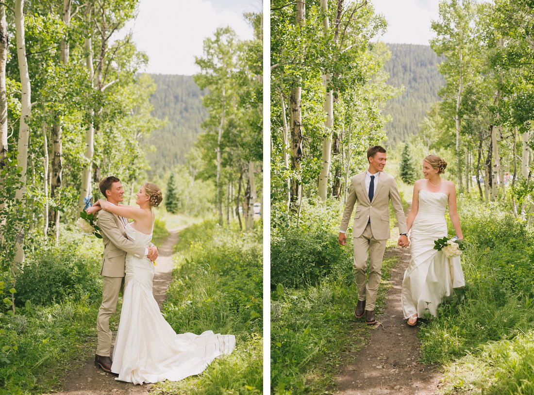Bride and groom in aspen trees on wedding day