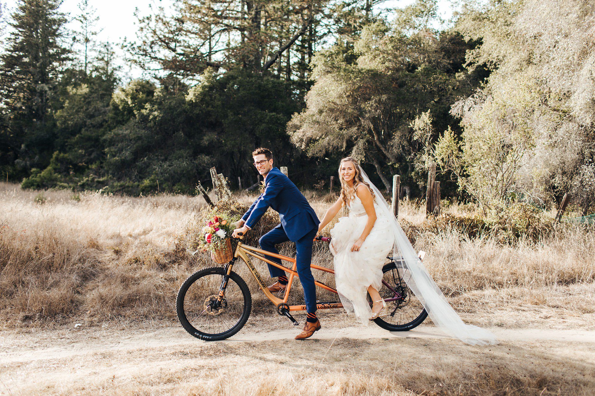 Bride and Groom on tandem bike